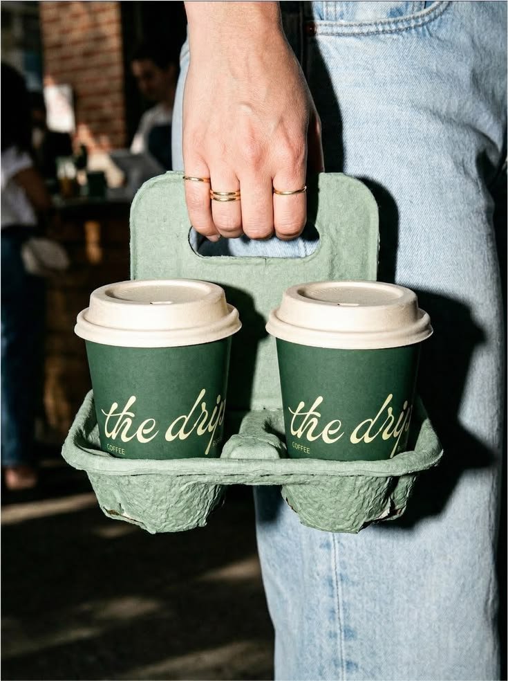 Custom printed paper cups in a takeaway drink holder